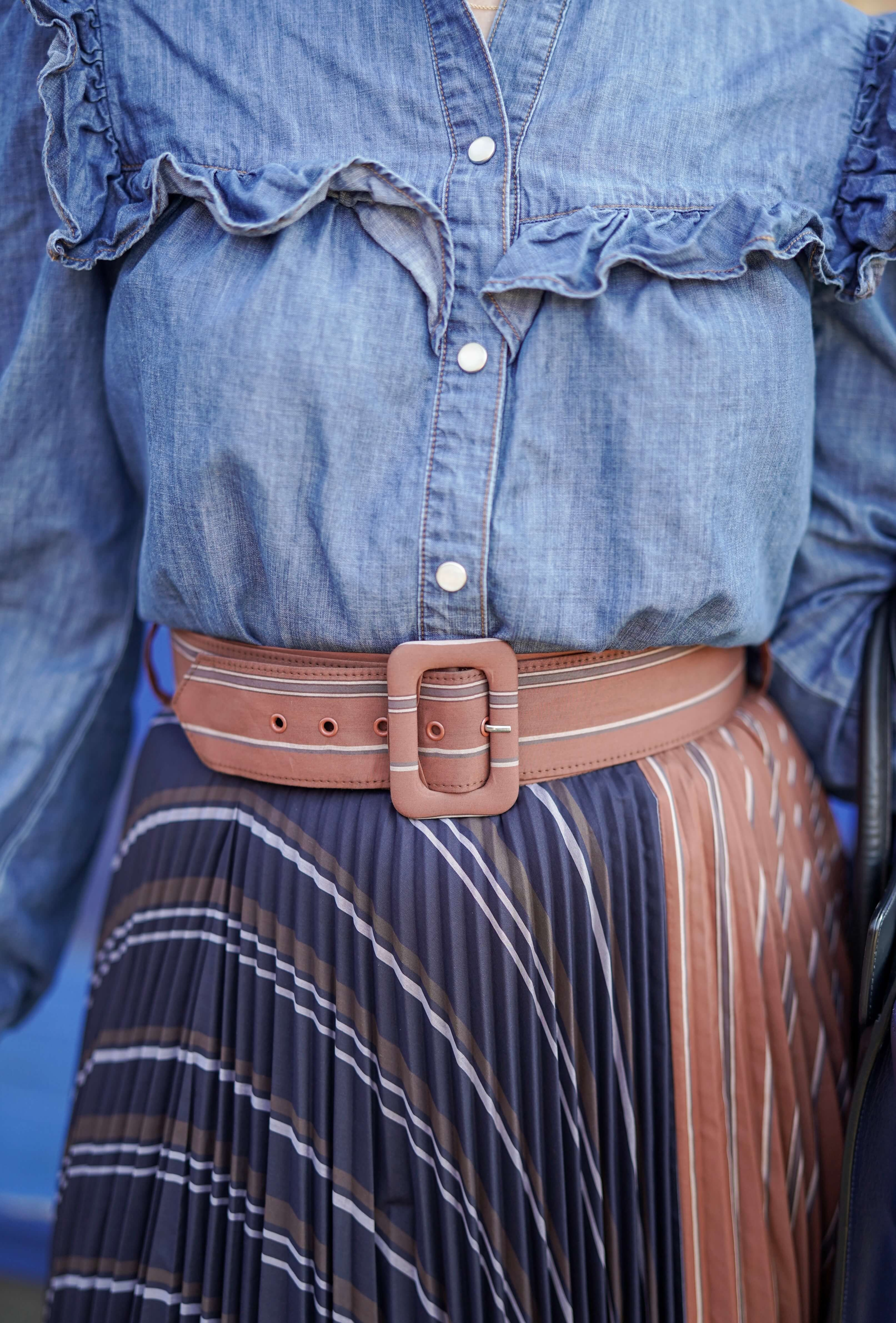 Anthropologie Pleated Skirt Veronica Beard Denim Shirt Coclico Booties Celine Luggage Bag Outfit by Modnitsa Styling